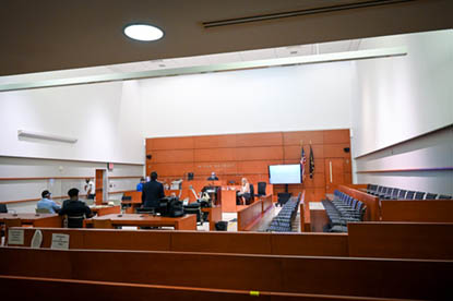 Courtroom with people in  it